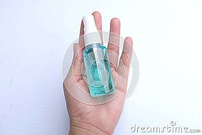 Spray alcohol female hands hand sanitizer gel to patient eliminate germs covid 19 prevention concept Stock Photo